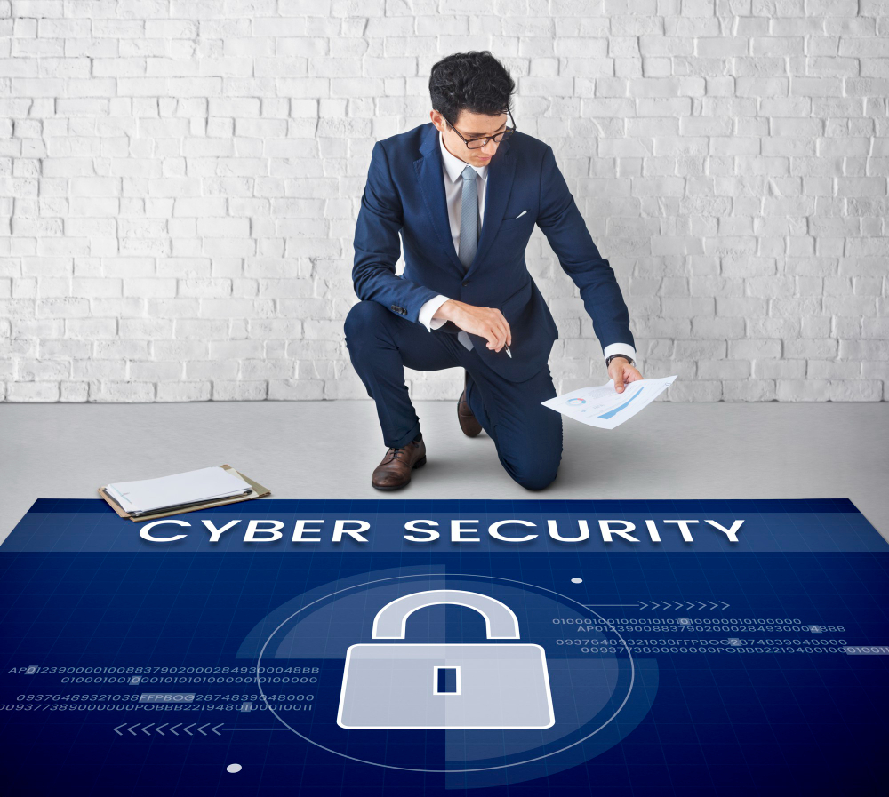 man working banner network with cyber security overlay on floor